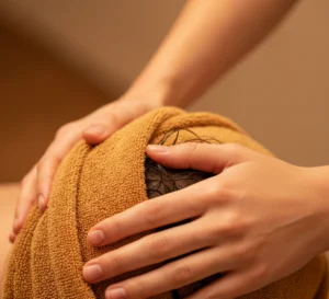 Woman receiving Indian head massage in Crystal Palace spa